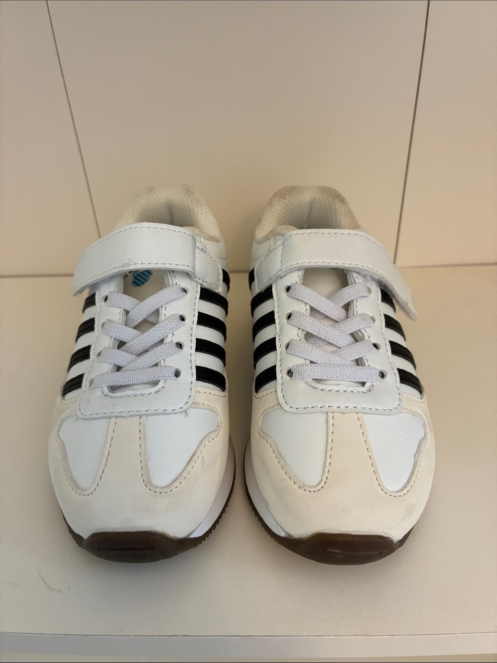 K-Swiss White Kids Sneakers with Black Stripes and Hook-and-Loop Strap